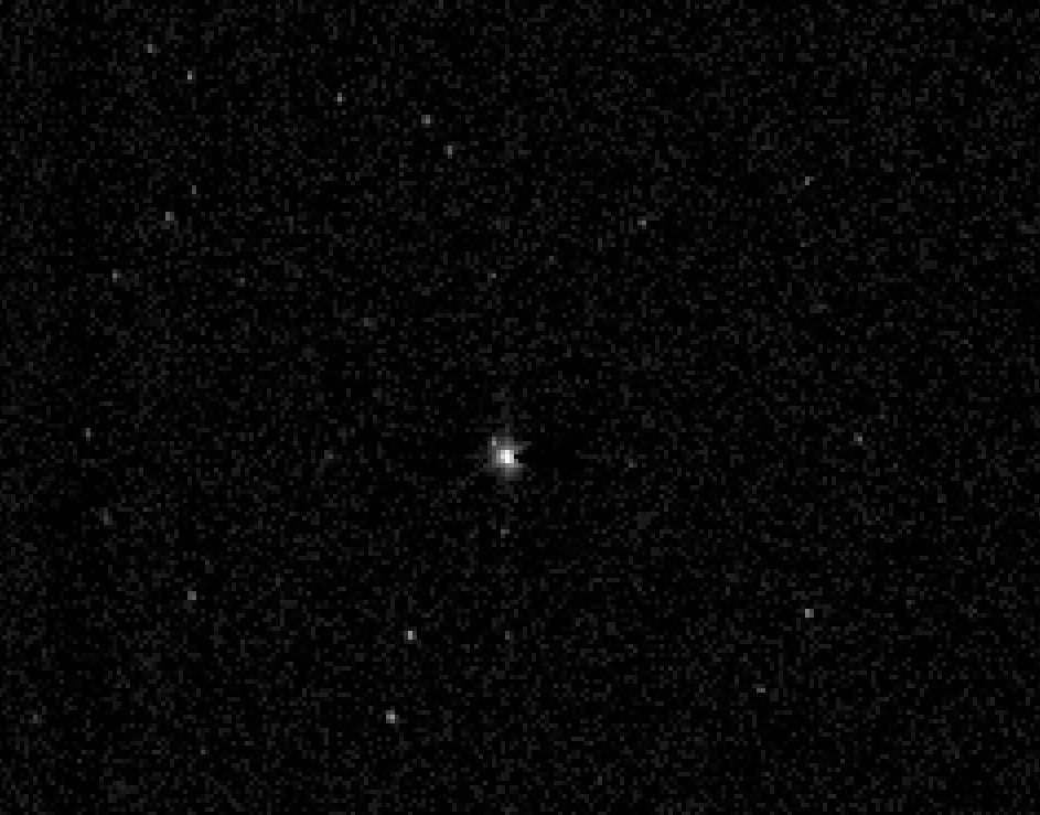 New Horizons, 10 Temmuz 2014'te 3,96 milyar kilometre öteden Neptün ve Triton'u fotoğrafladı. [NASA]