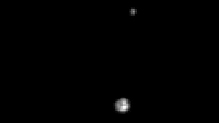Hubble tarafından çekilen en detaylı Plüton ve Charon fotoğrafı. [NASA]