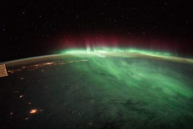 NorthernLights mixed with the clouds below look rather imposing. GoodMorning from @Space Station YearInSpacef