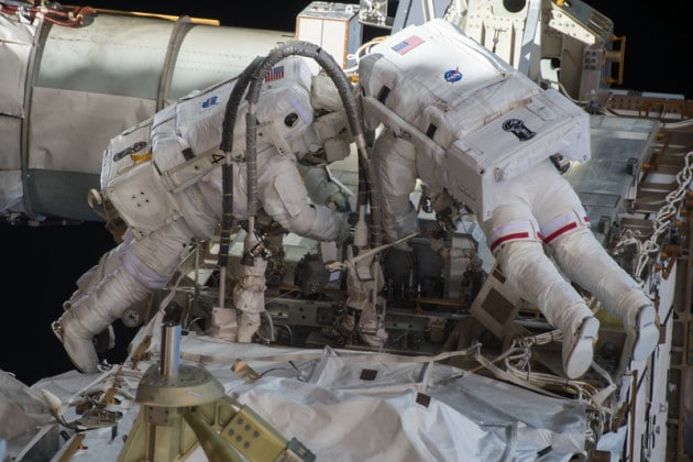 Teamwork @astro kjell and I working outside @Space Station with @Astro Kimiya inside getting us safely out the door